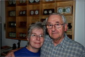 Manfred Mädler with his wife Monika in front of their chess clock collection