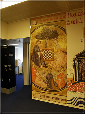 In the picture: a medieval chess motif on the wall